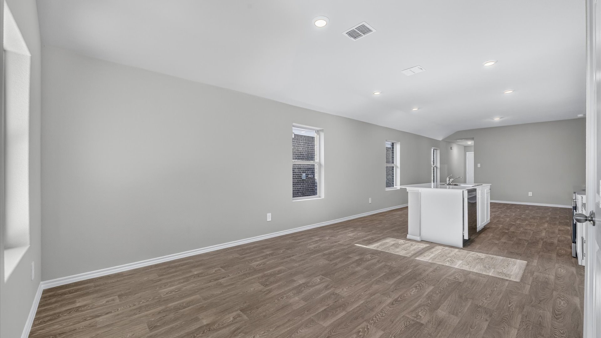 Open kitchen, living, and dining room