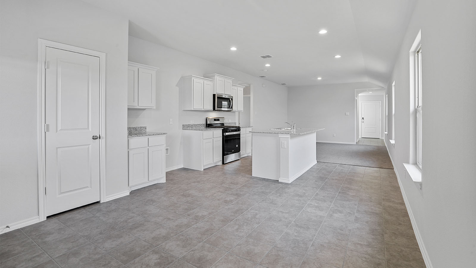 Open kitchen, dining, & living