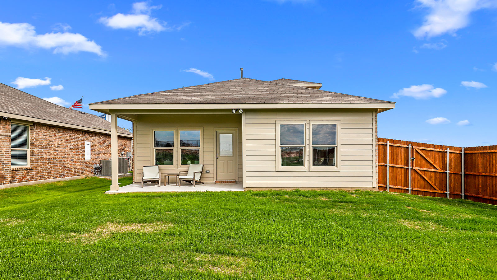 Spacious backyard and covered patio