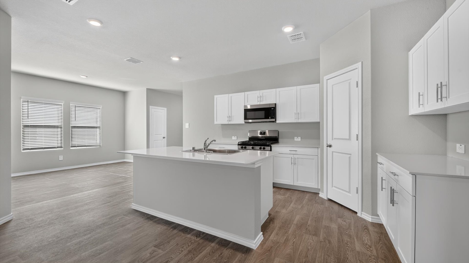Kitchen, dining, and living area