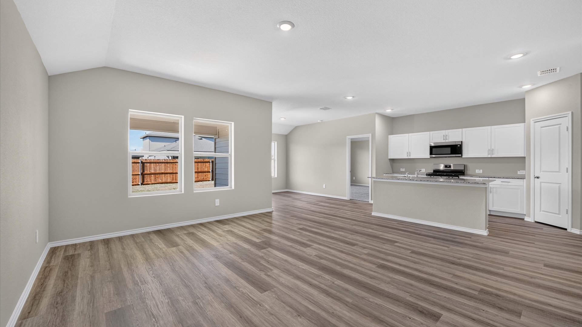 Open kitchen, dining, and living area