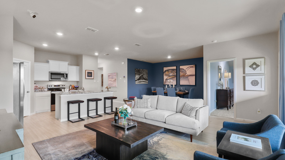 Open living, kitchen, and dining