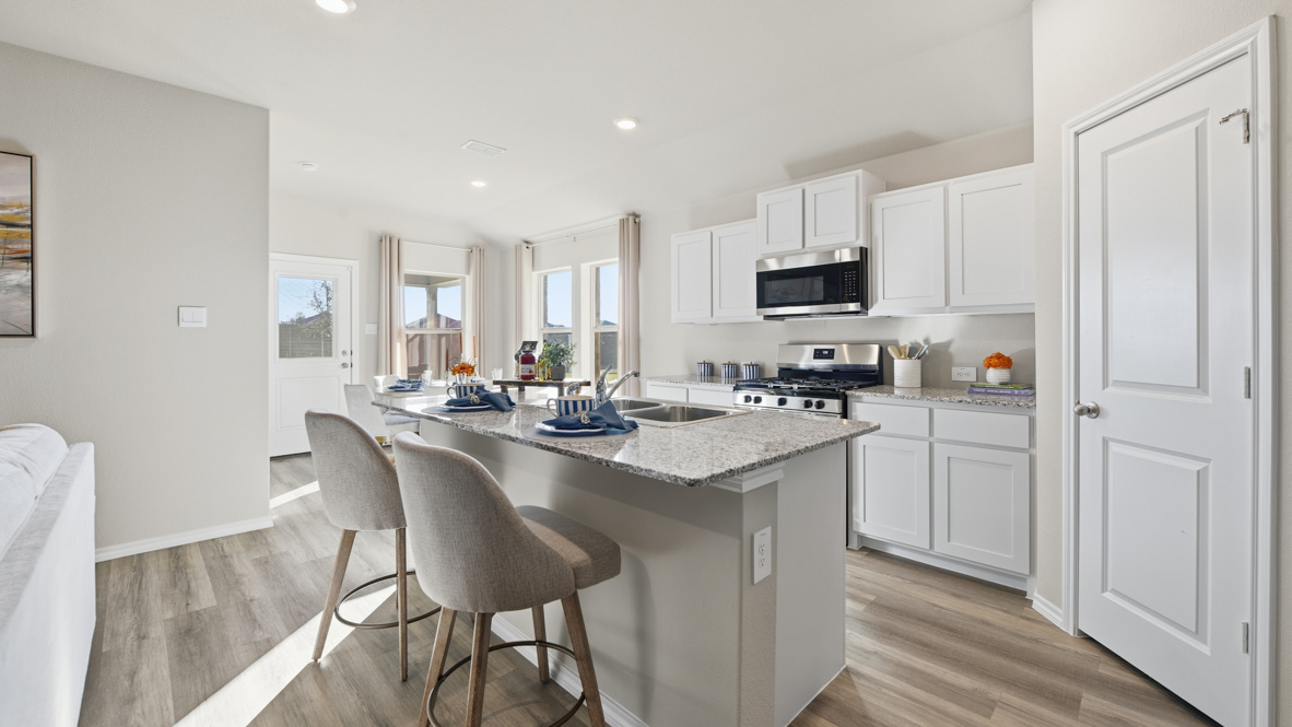 Open concept kitchen overlooking family room