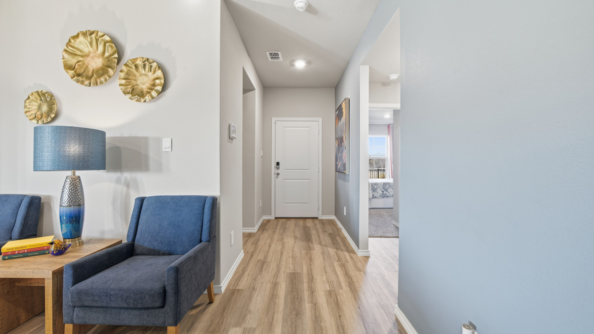 Front foyer/entry and hallway leading to open common space