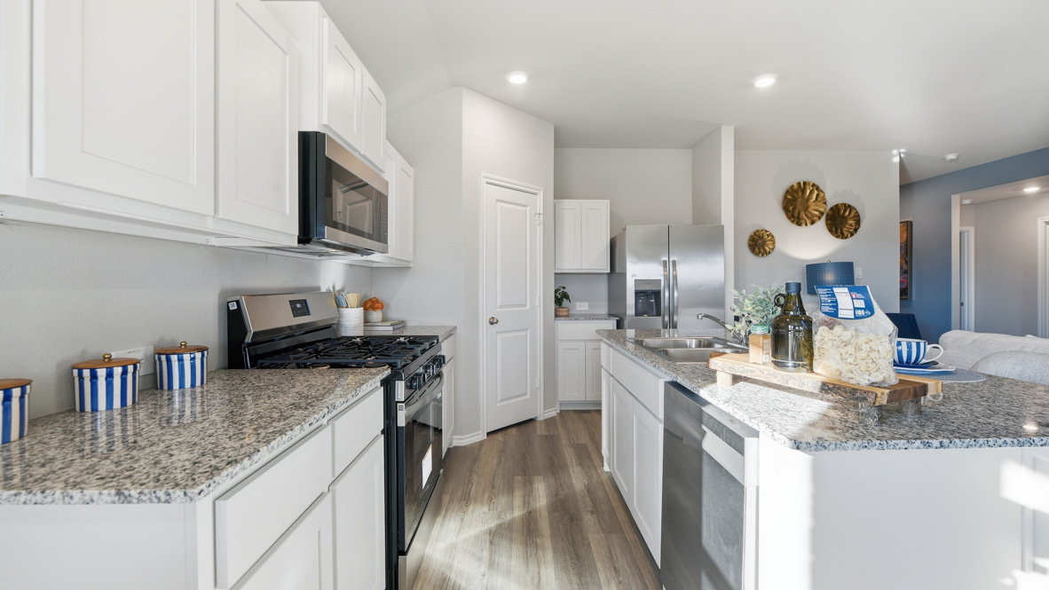 Open kitchen with stainless steel appliances