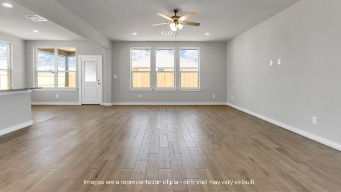 Open living and family room area with ample natural light