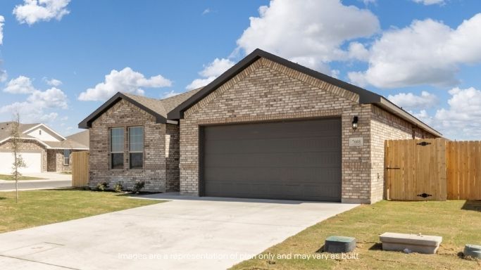 Single story classic brick home with front entry