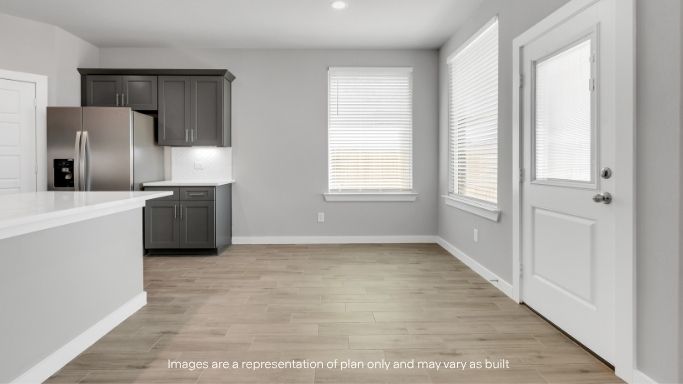 Cozy dining nook space next to kitchen