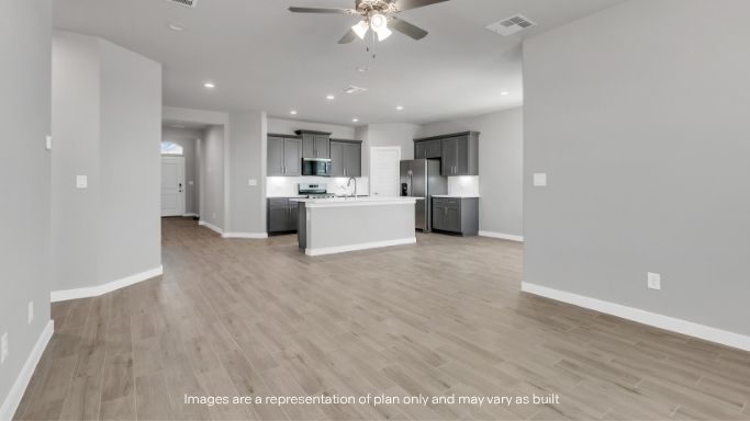 Open concept kitchen, living, family, and dining room space