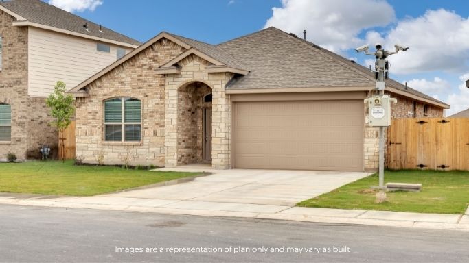 Side view of single story timeless brick home