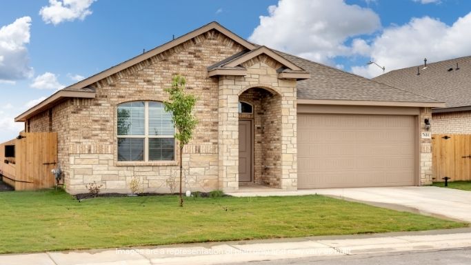 Single story classic brick home with front entry