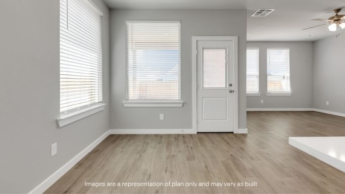 Open concept kitchen, living, family, and dining room space
