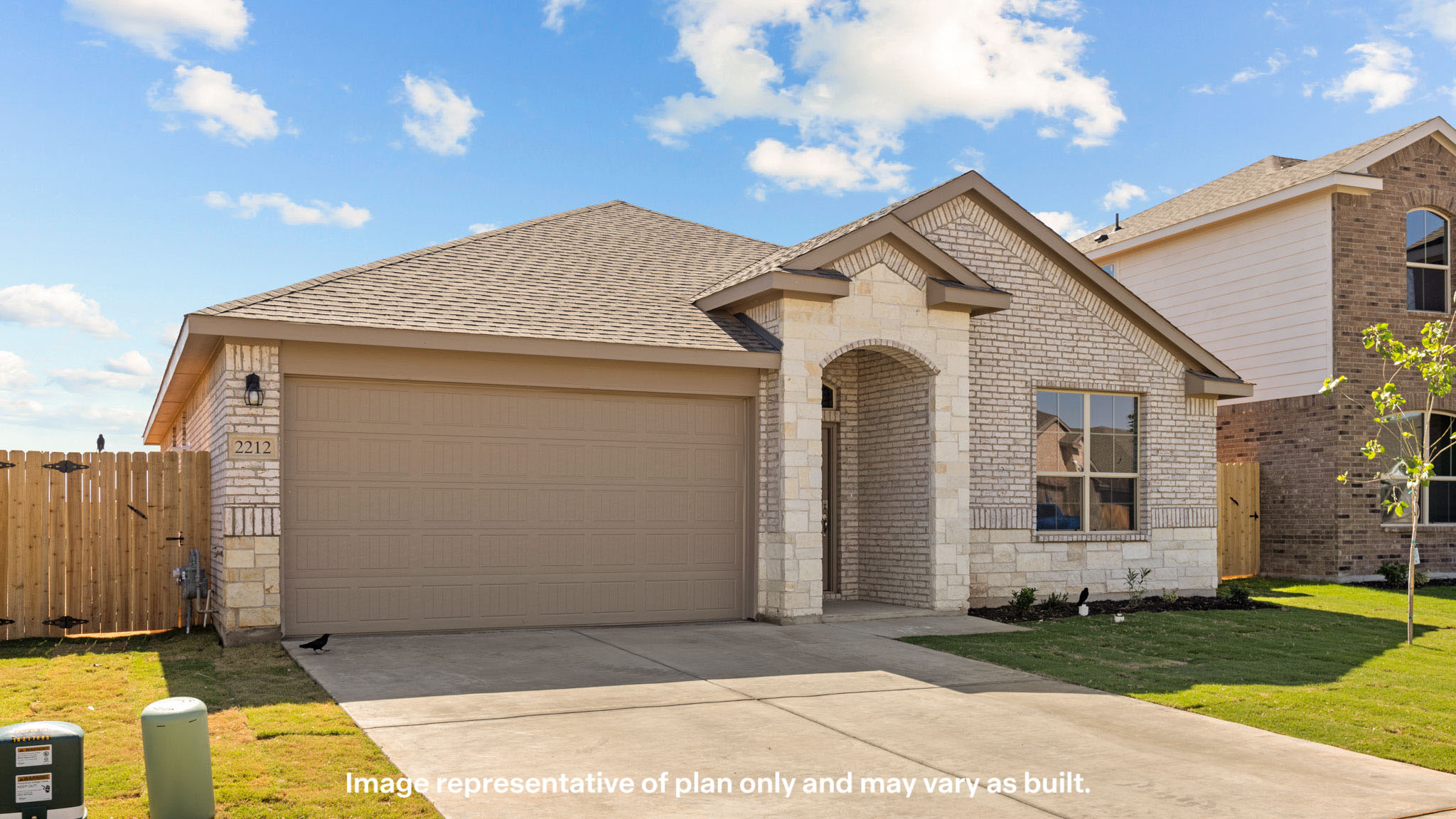 Single story classic brick home with front entry