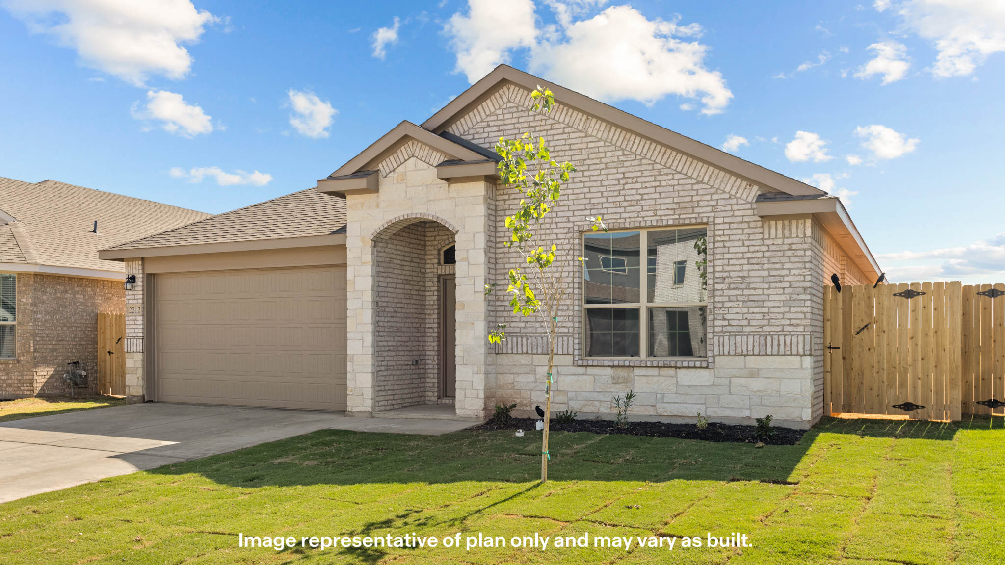 Side view of single story timeless brick home