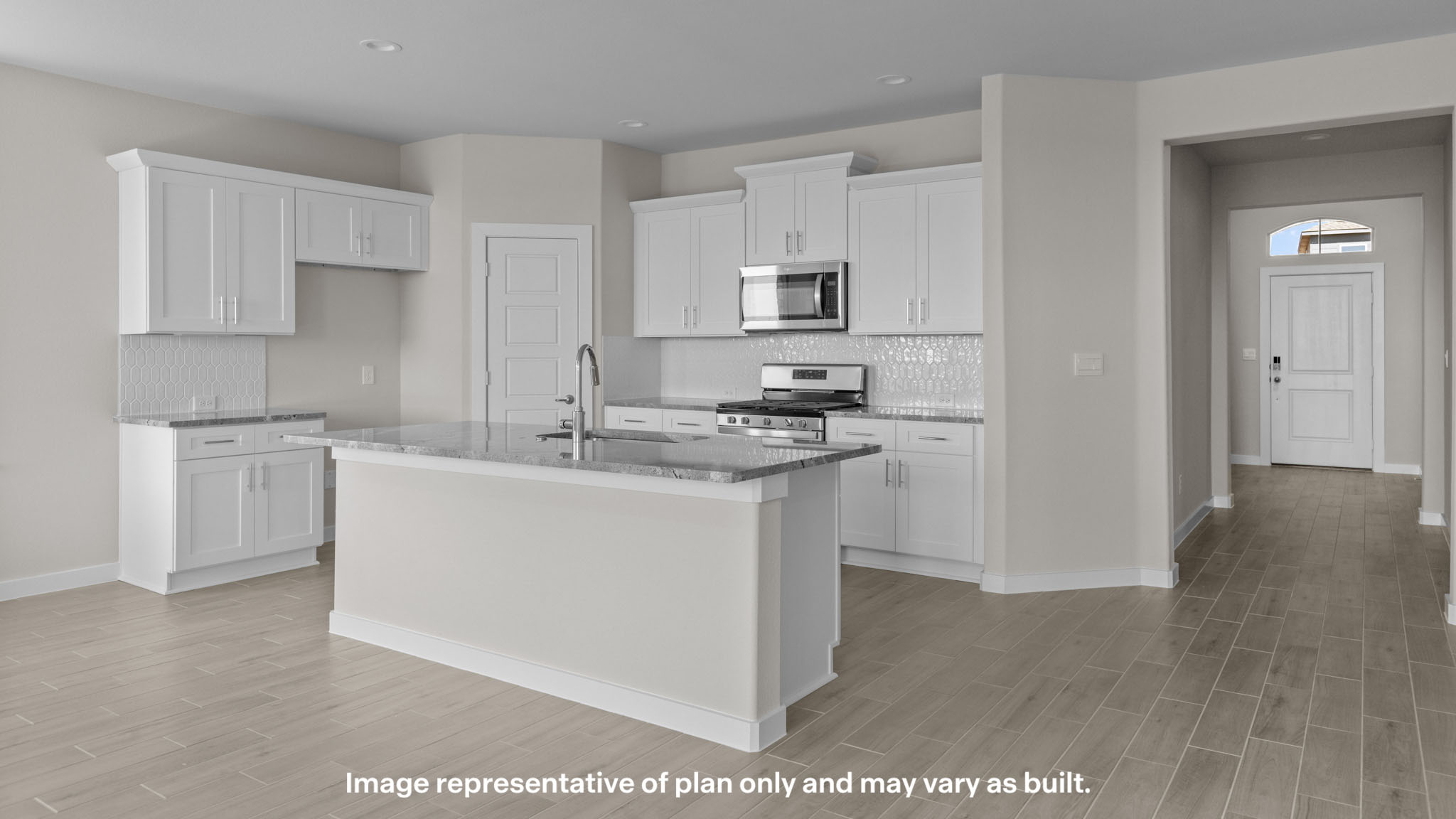 Spacious open concept kitchen with island and counter prep space