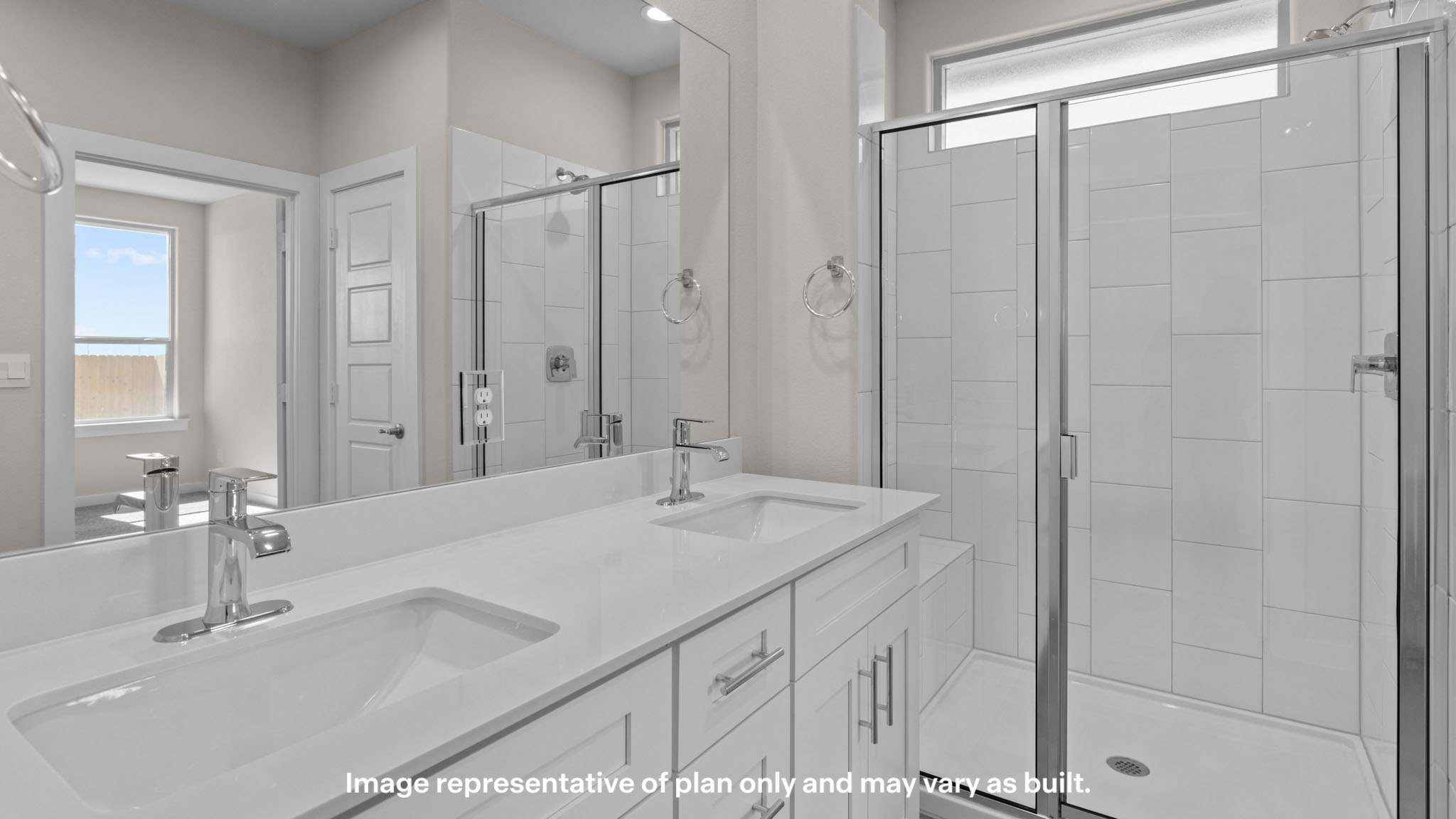 Private attached primary bathroom with built in vanity