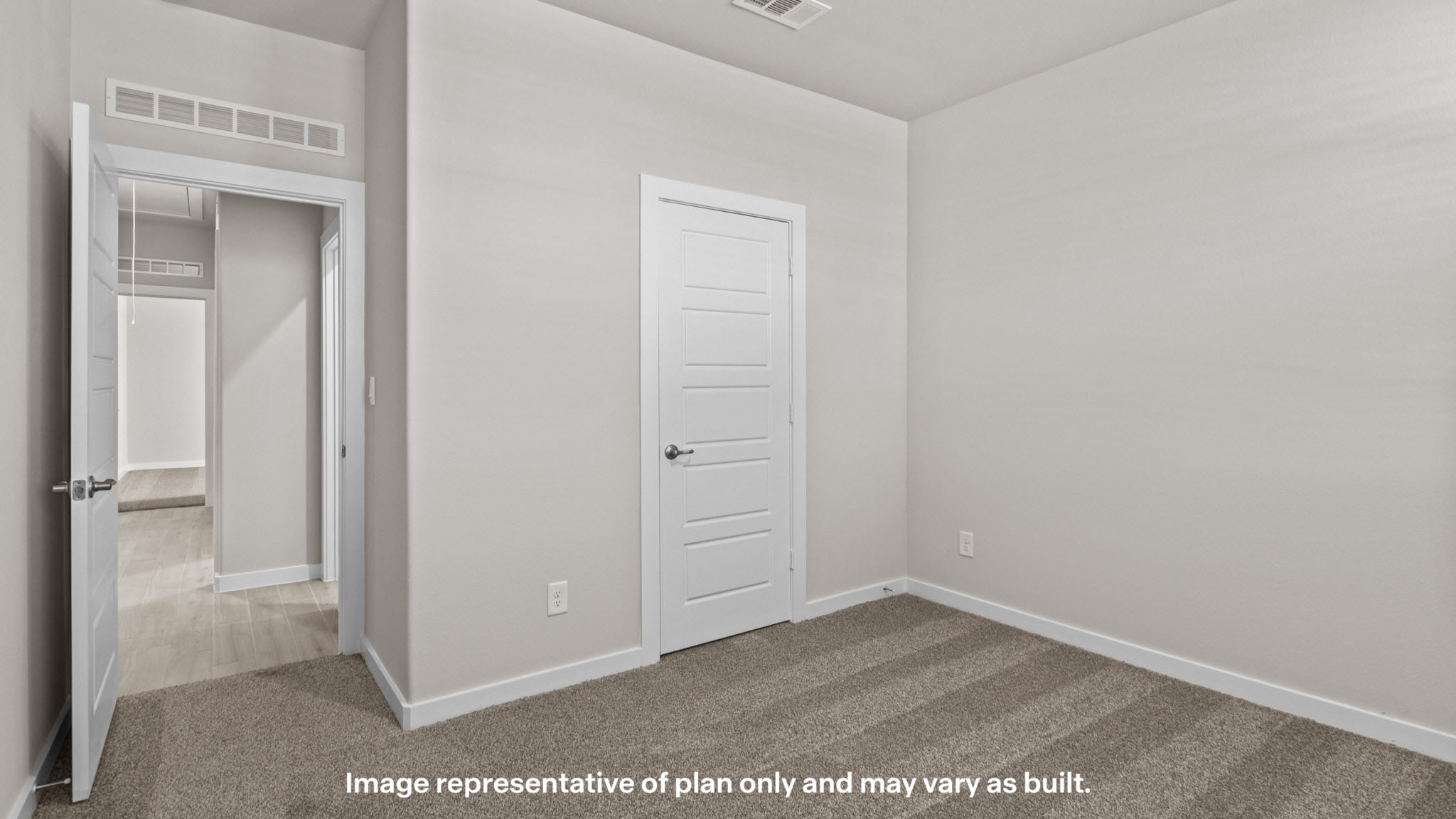 Guest bedroom 1 with front windows and ample natural light