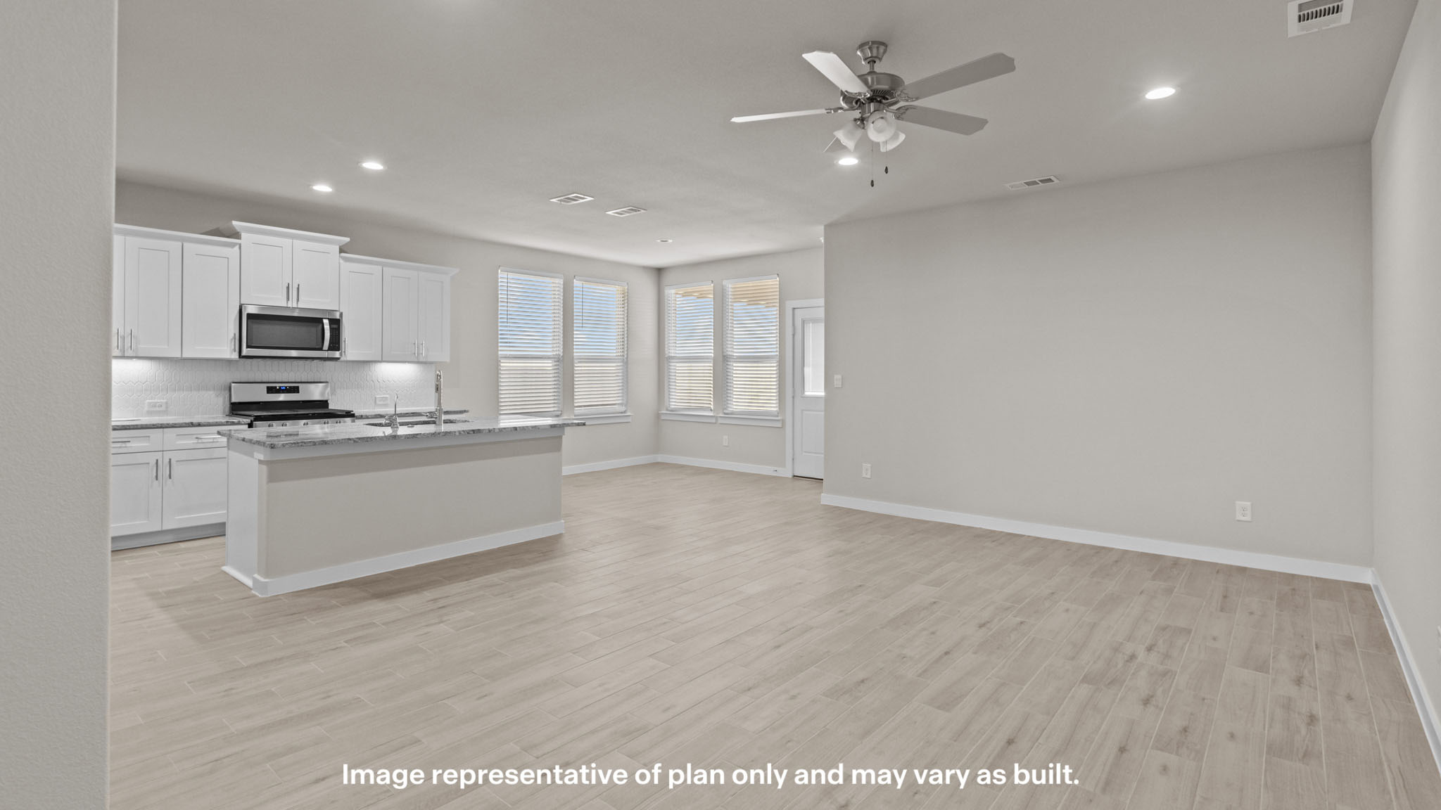 Open concept kitchen, living, family, and dining room space