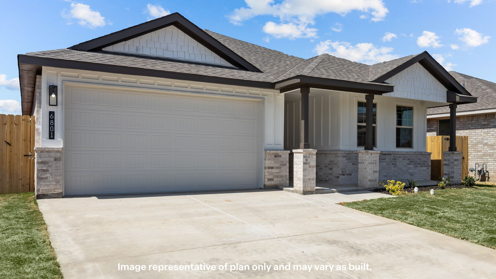 Single story modern farmhouse home with front entry