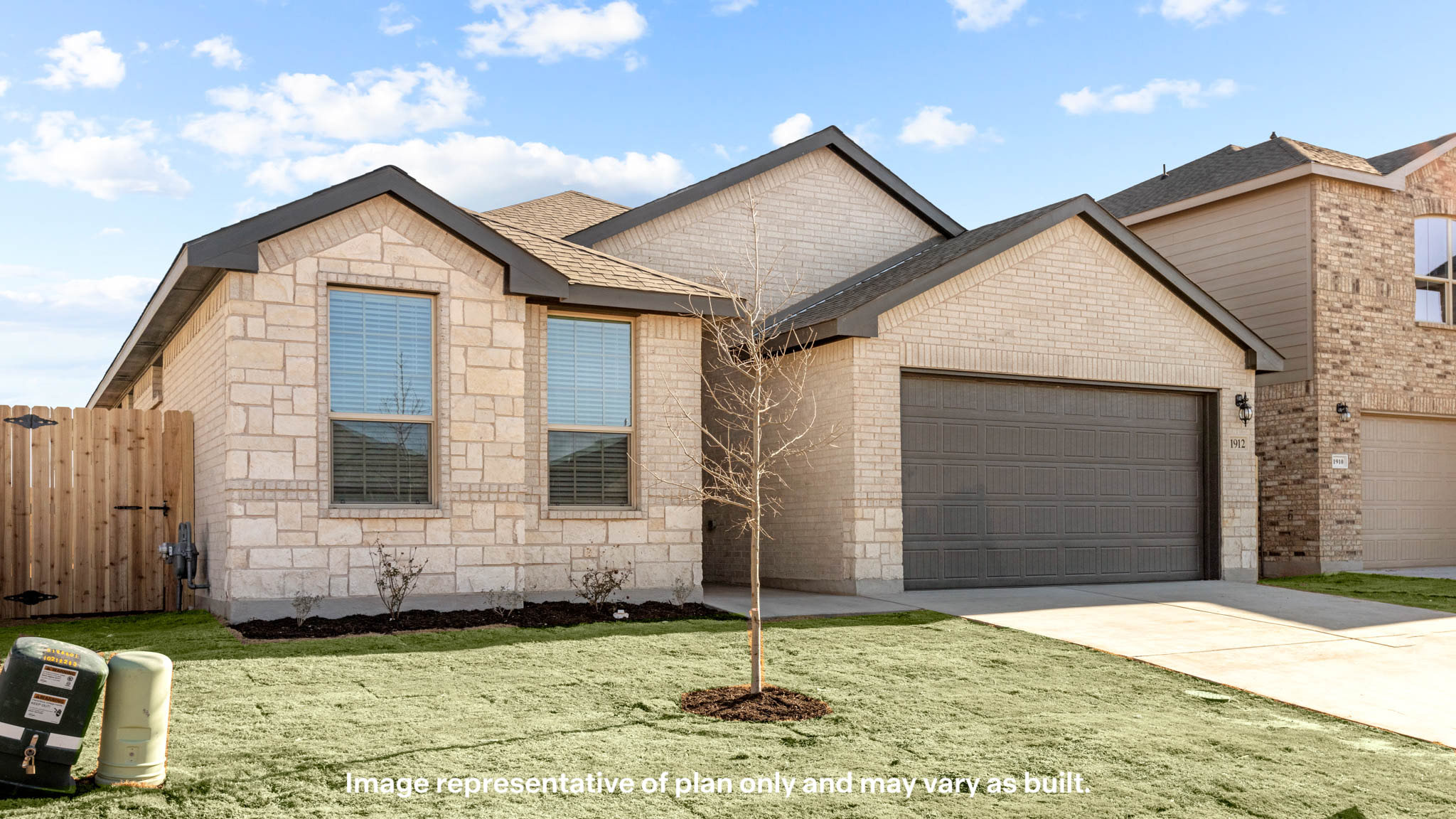 Single story classic brick home with front entry