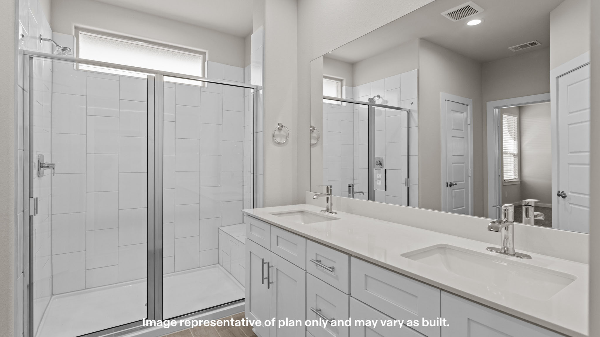 Private attached primary bathroom with built in vanity