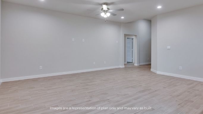 Guest bedroom 2 with side window and plush carpet floor