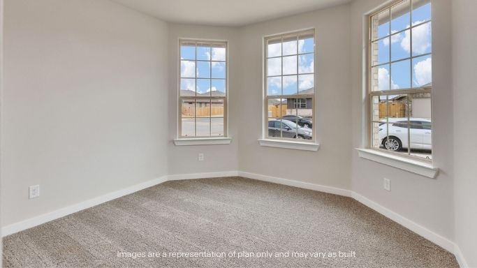 Guest bedroom 3 with plush carpet floors and spacious closet
