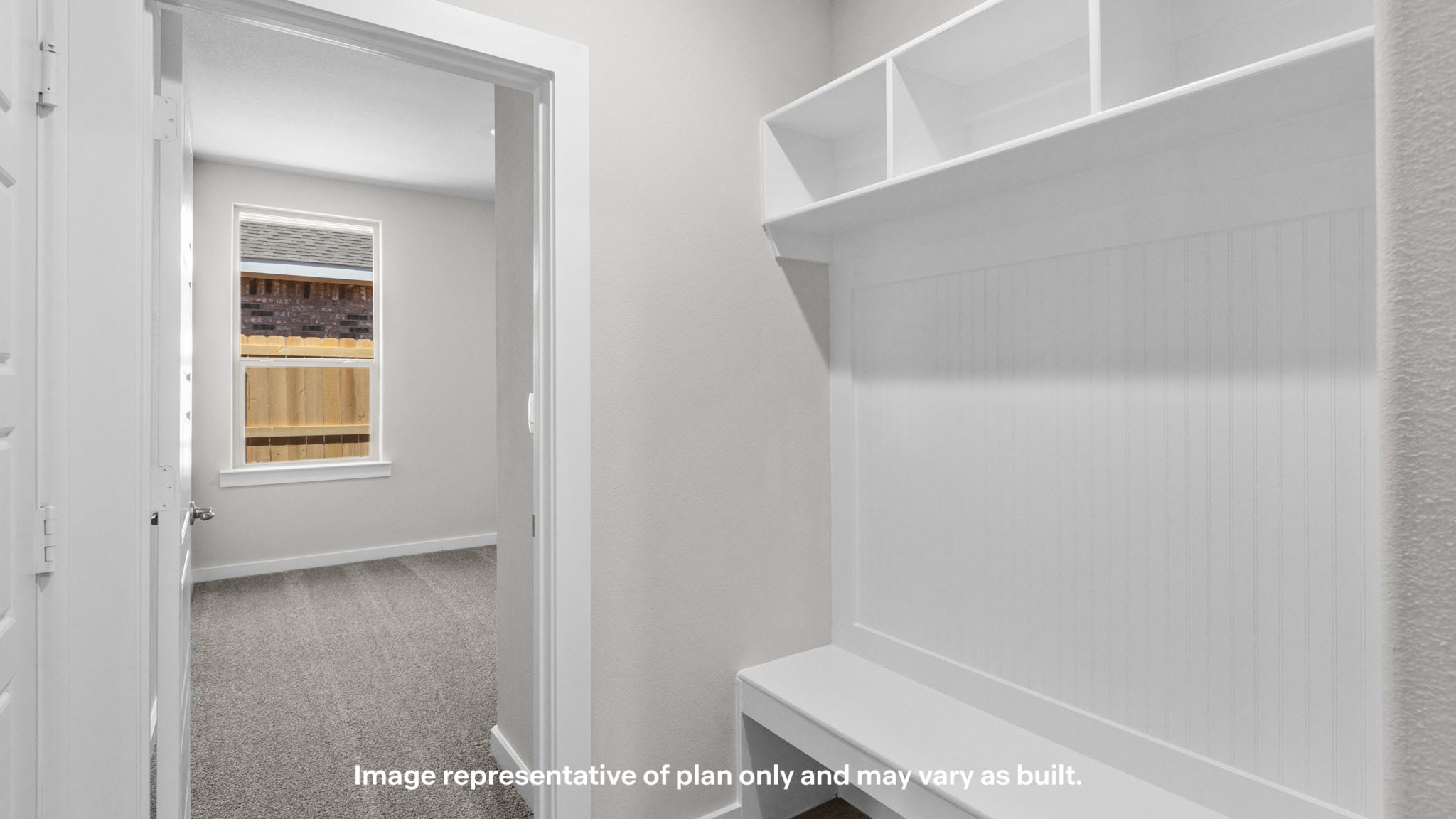 Foyer with mudroom space and additional storage