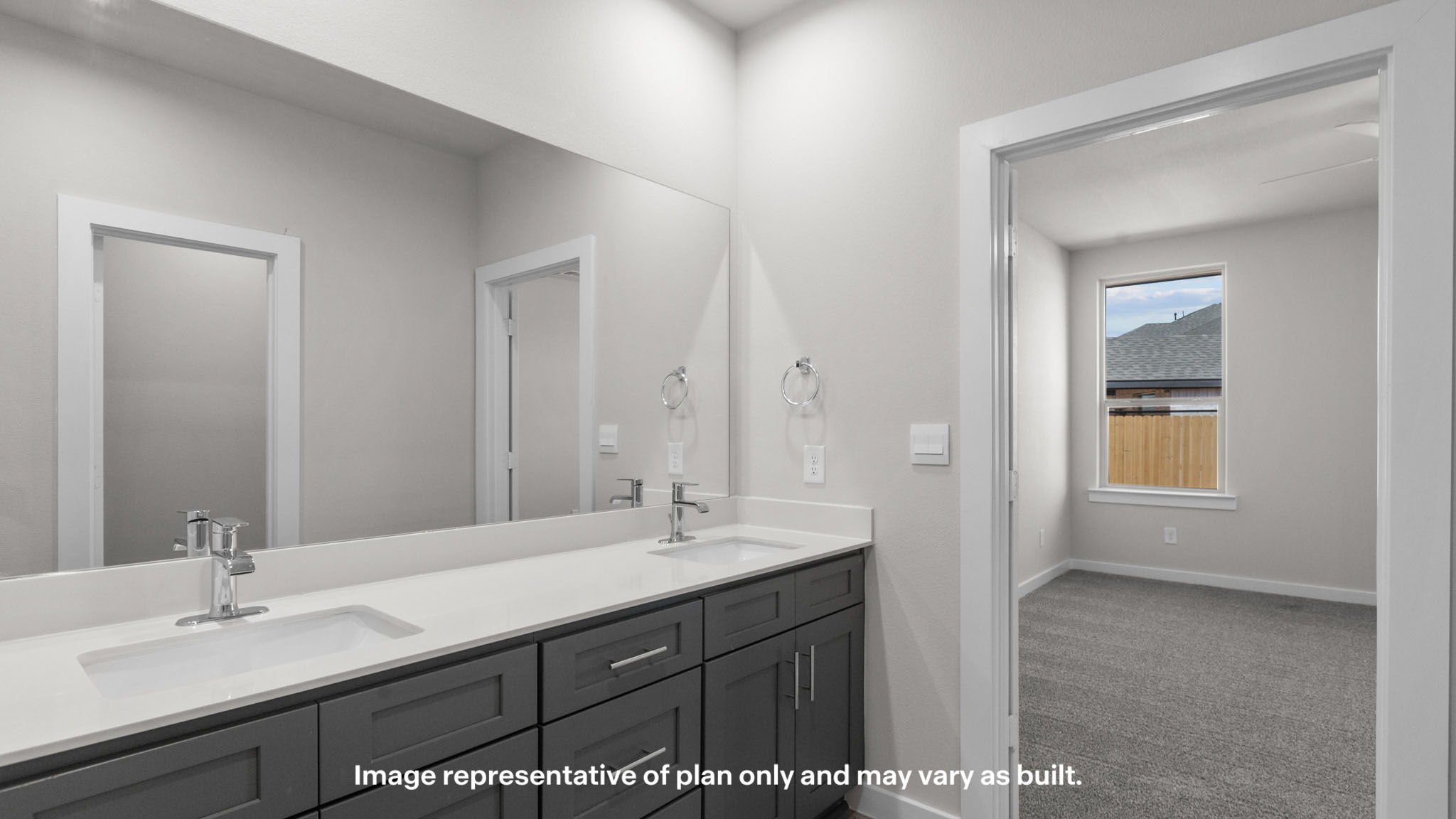 Primary bathroom with luxurious shower and built in storage