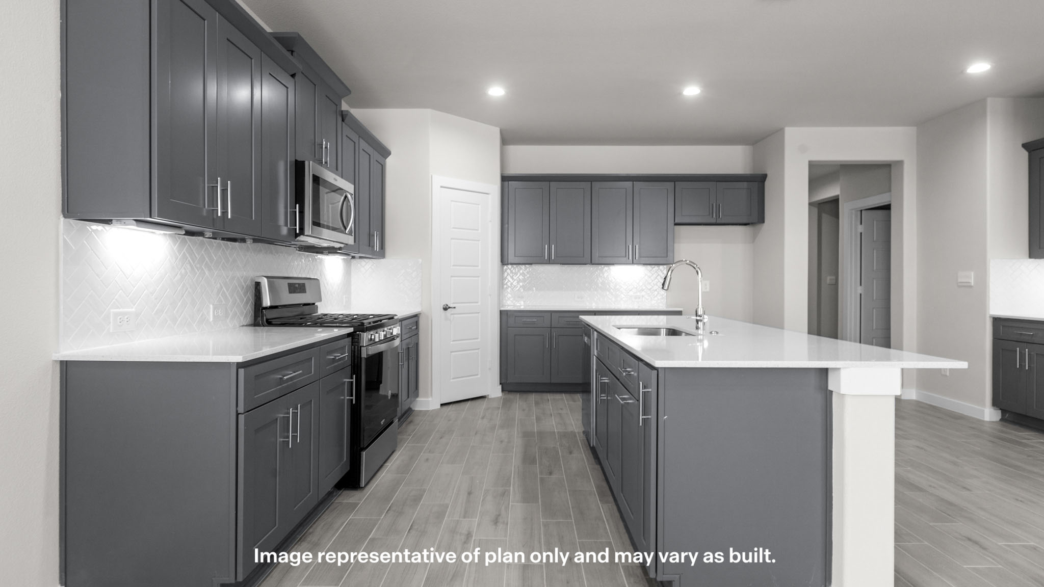 Spacious open kitchen overlooking family and living space