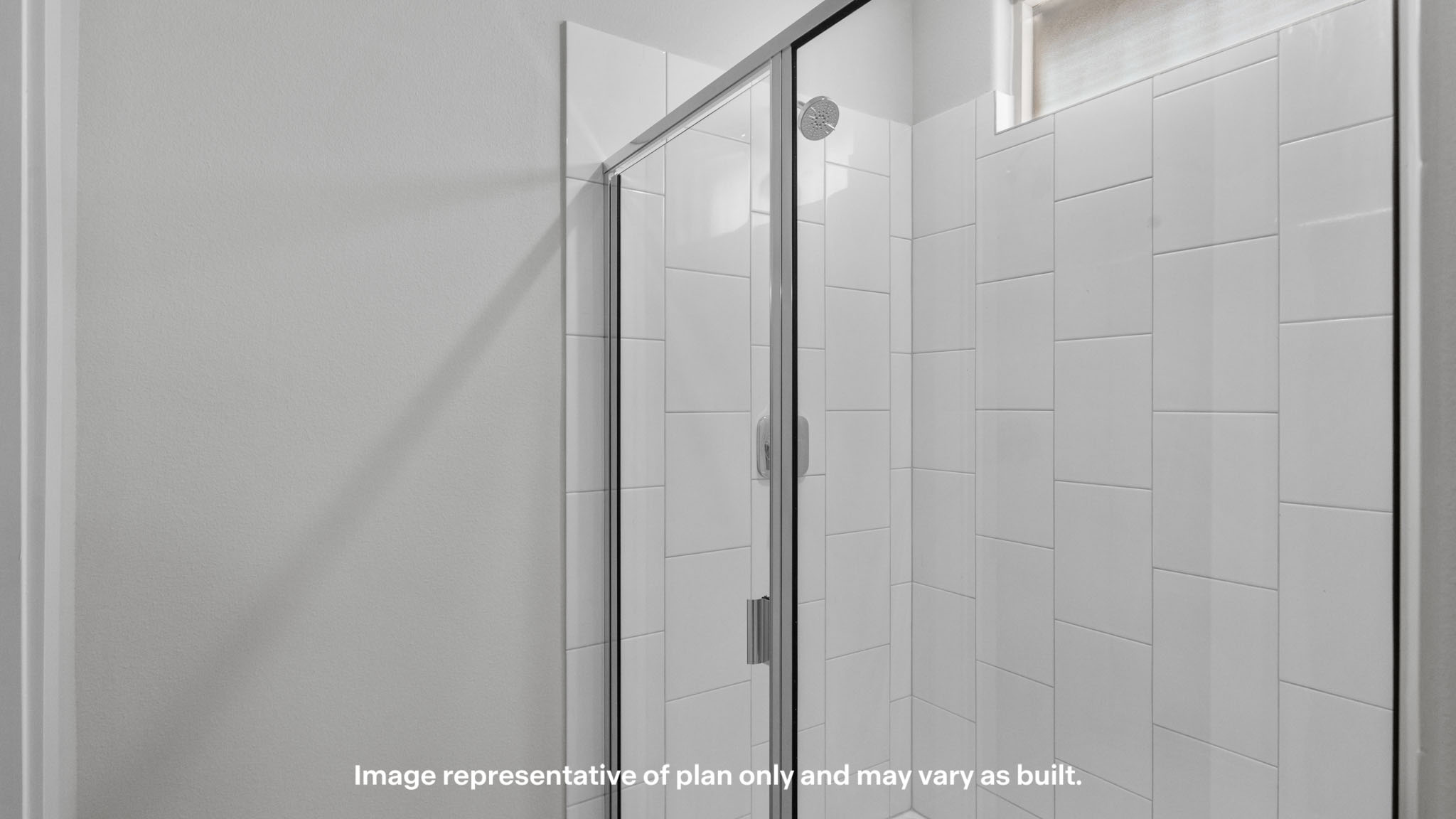 Primary bathroom with luxurious shower and built in storage