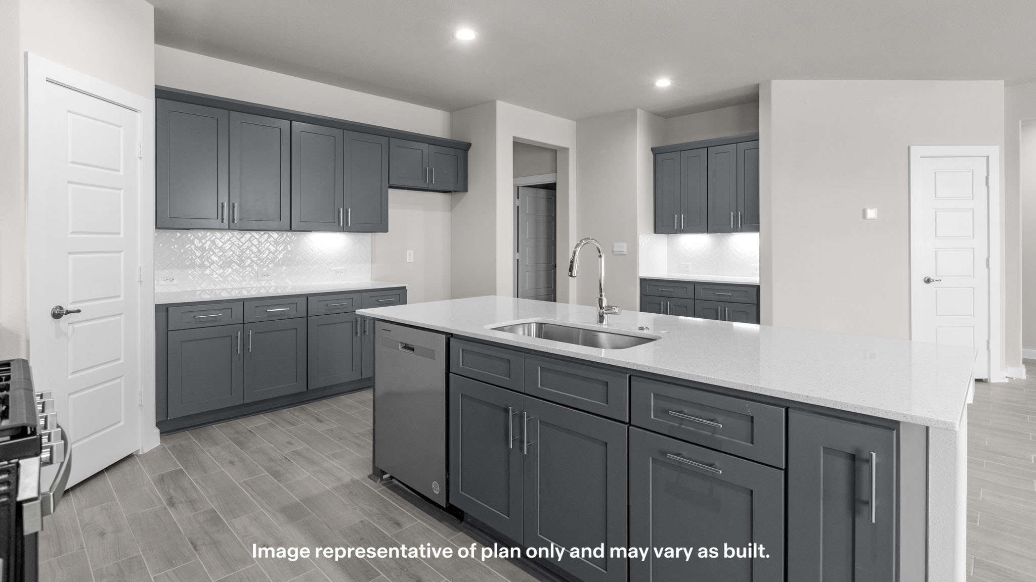 Spacious open concept kitchen with island and counter prep space