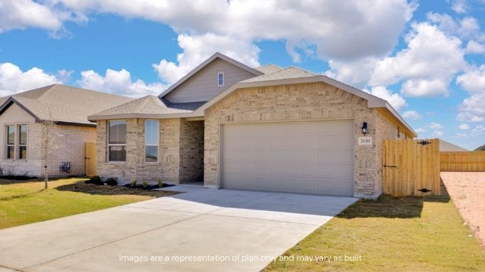 Side view of single story timeless brick home