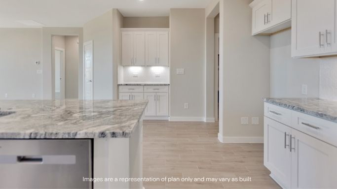 Spacious open concept kitchen with island and counter prep space
