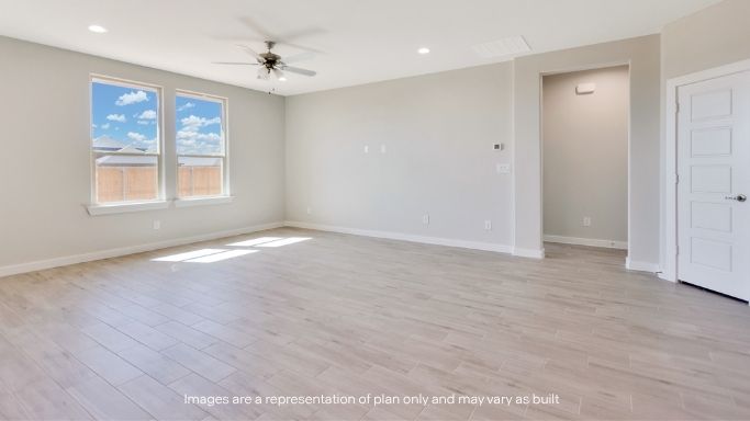 Open living and family room area with ample natural light