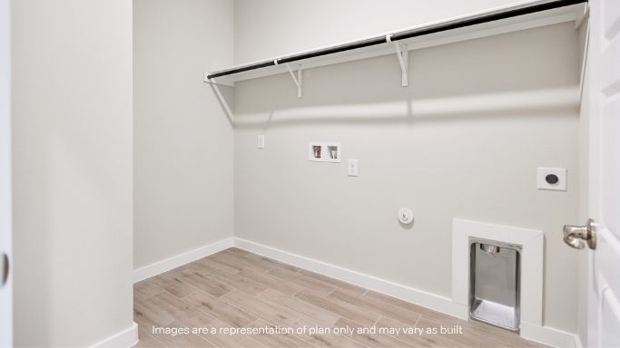 Laundry room and utility closet space with extra storage