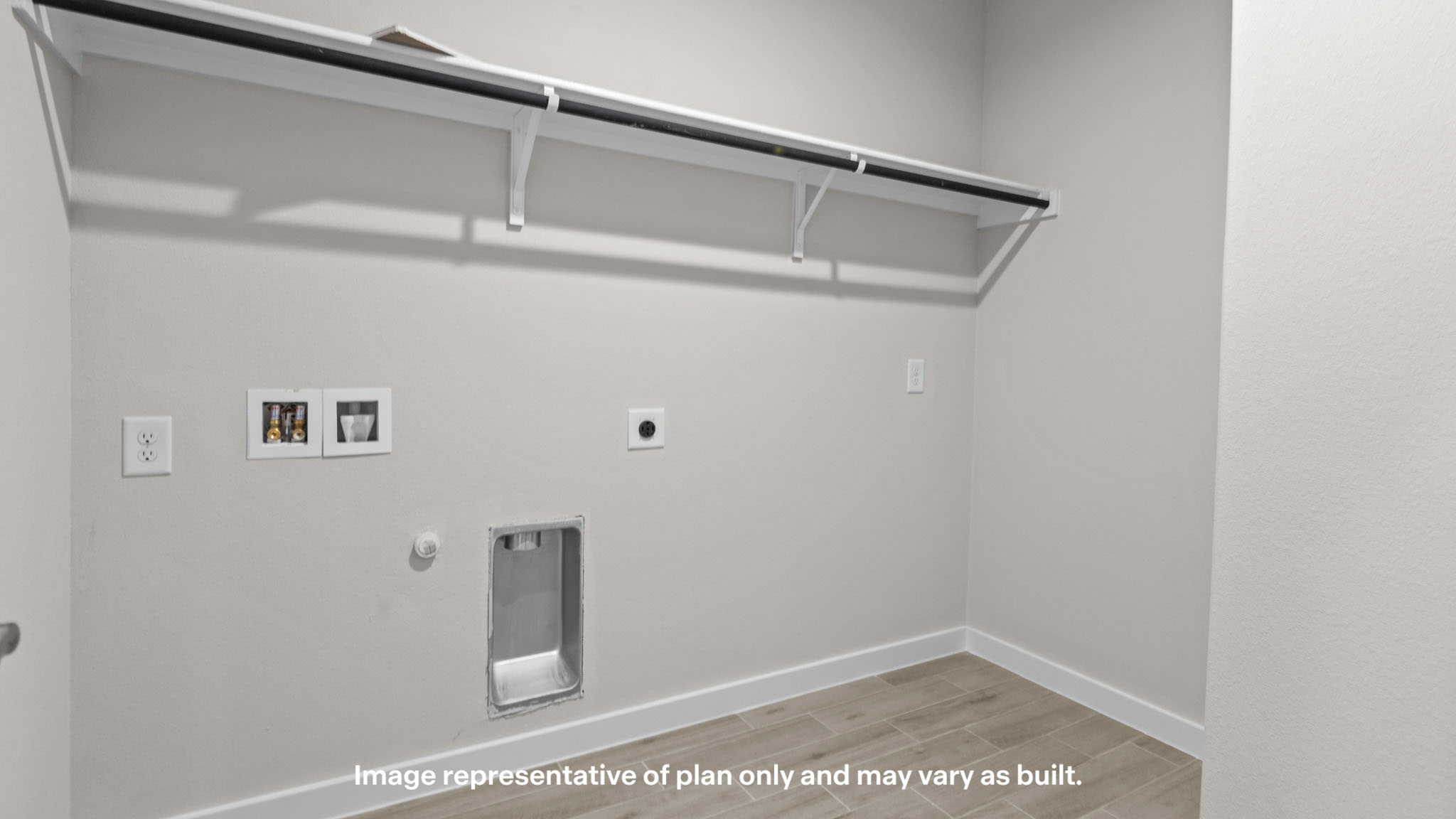 Laundry room and utility closet space with extra storage