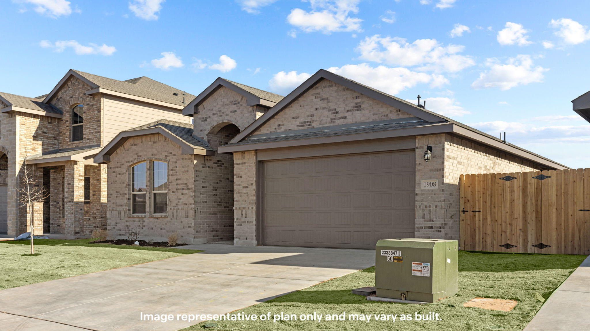 Side view of single story timeless brick home