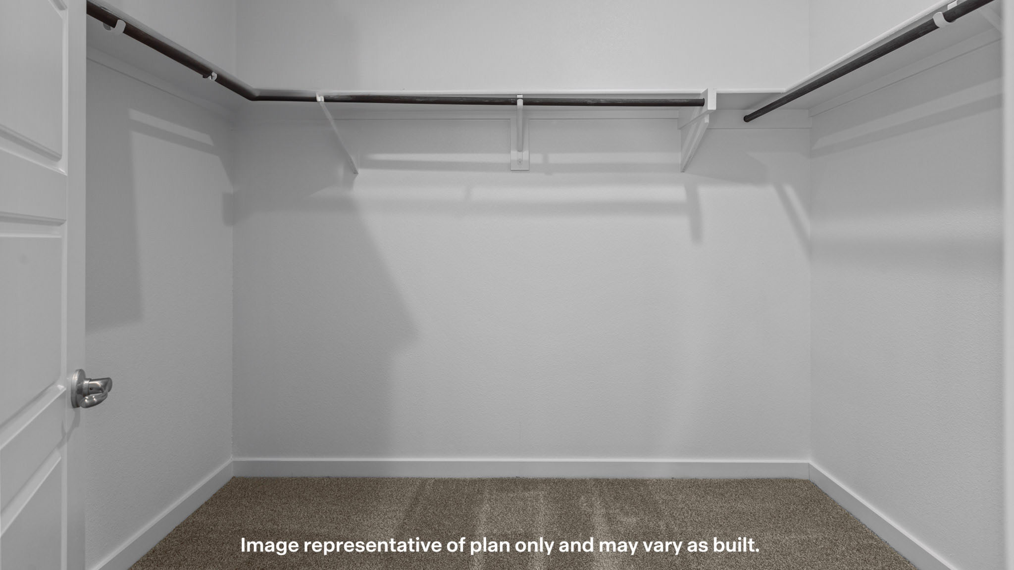 Primary walk-in closet with extra storage space