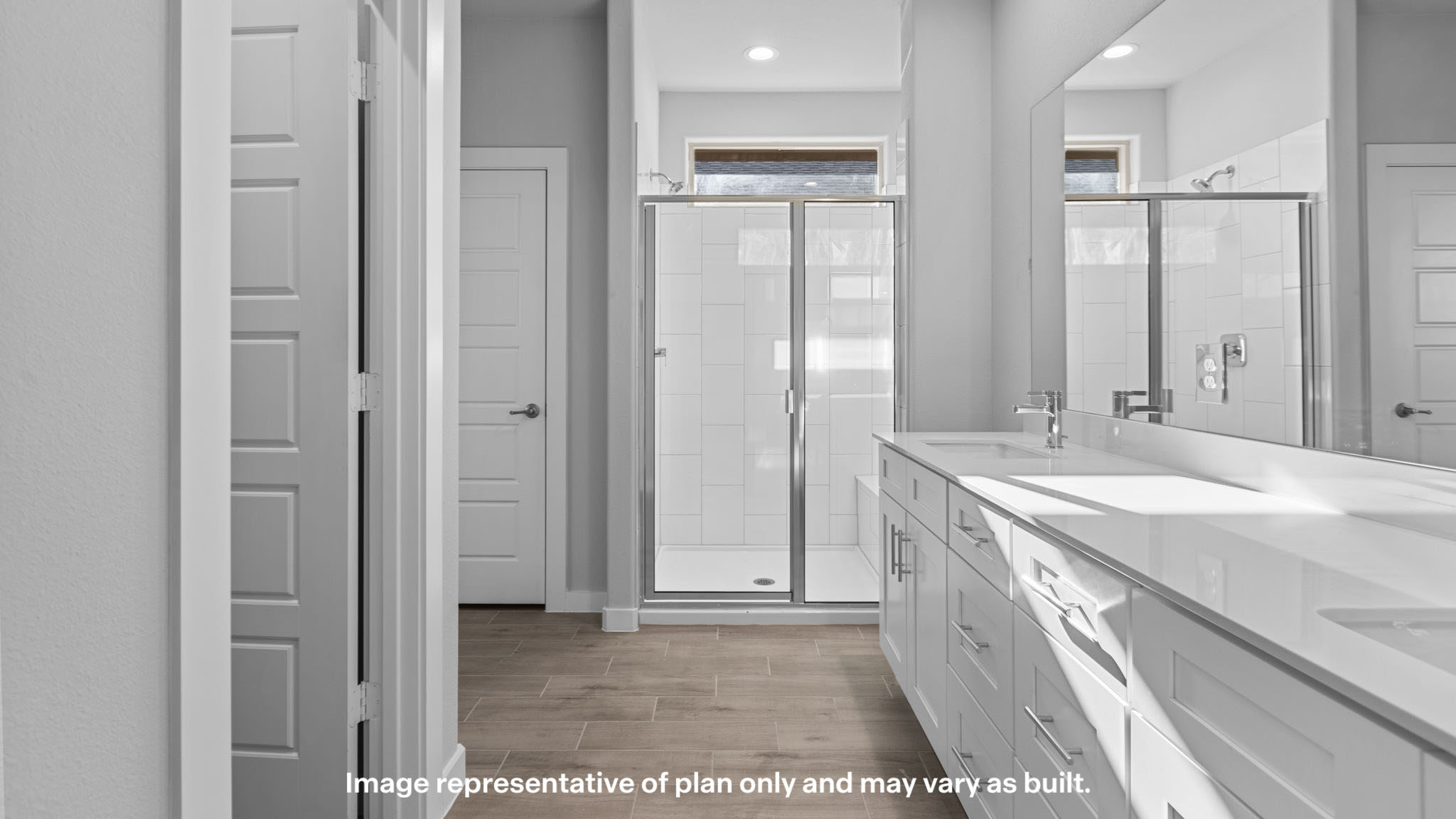 Primary bathroom with luxurious shower and built in storage