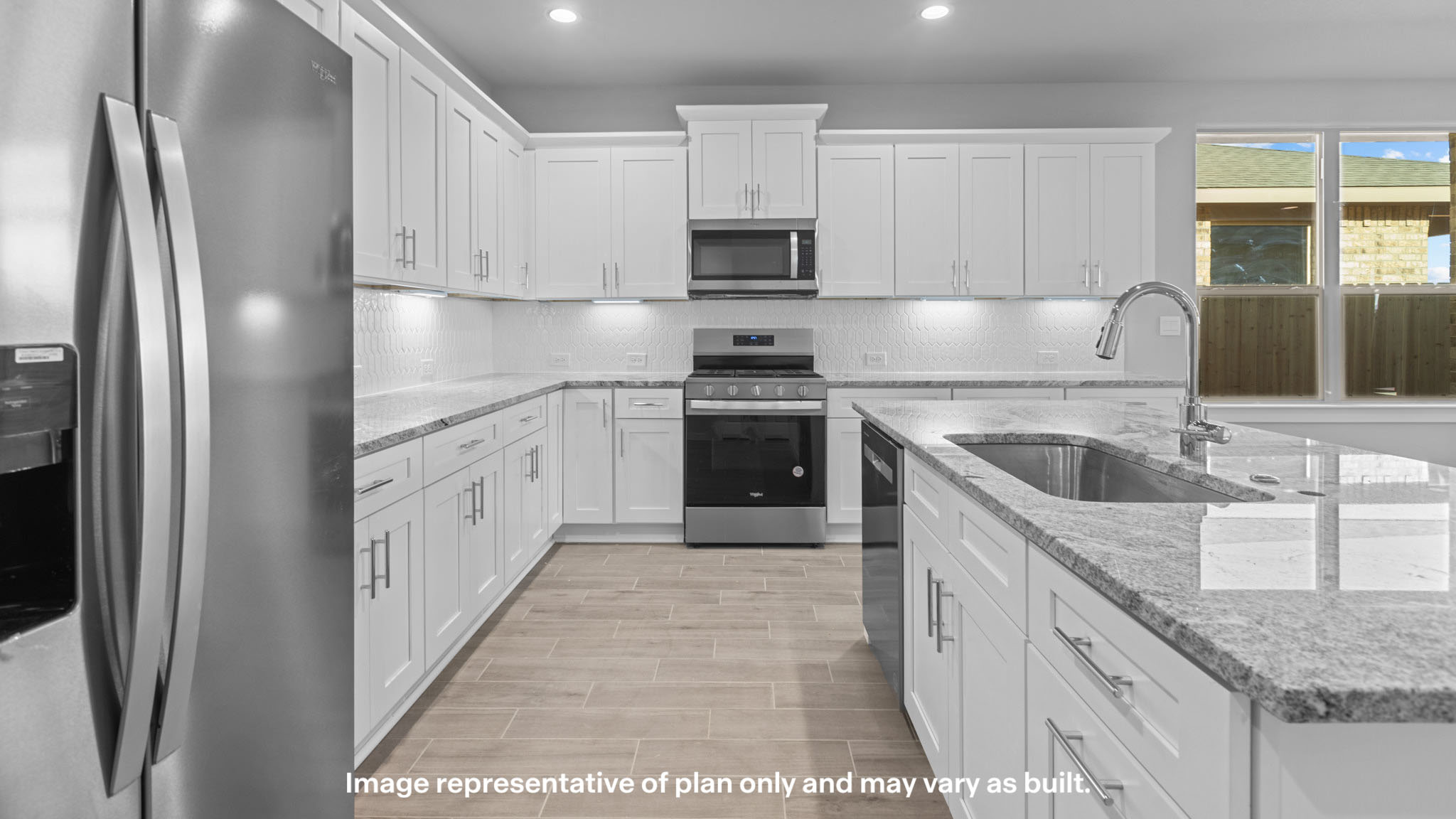 Spacious open kitchen with ample natural light