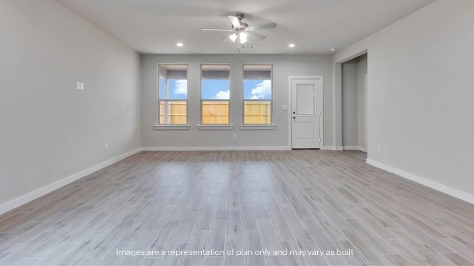 Open living and family room area with ample natural light