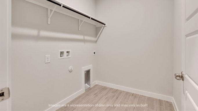 Laundry room and utility closet space with extra storage