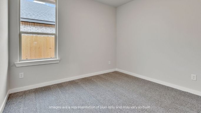 Guest bedroom 4 with plush carpet and side window