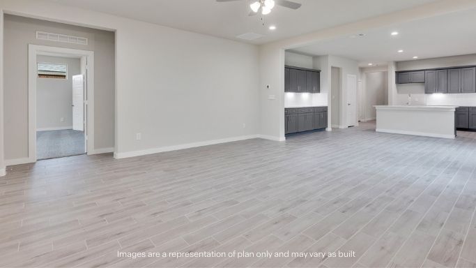 Open living and family room area with ample natural light