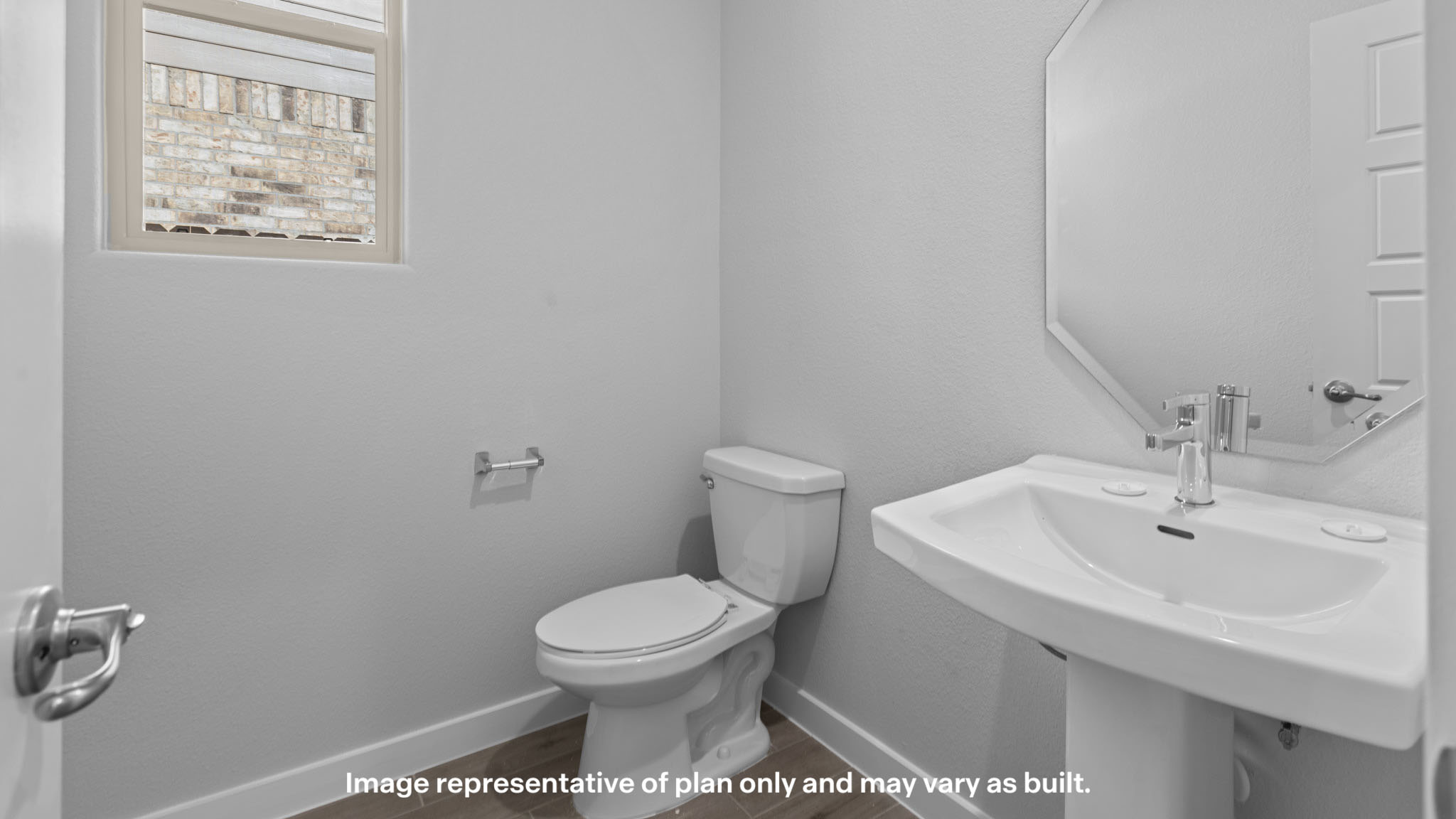 Half bathroom between common spaces
