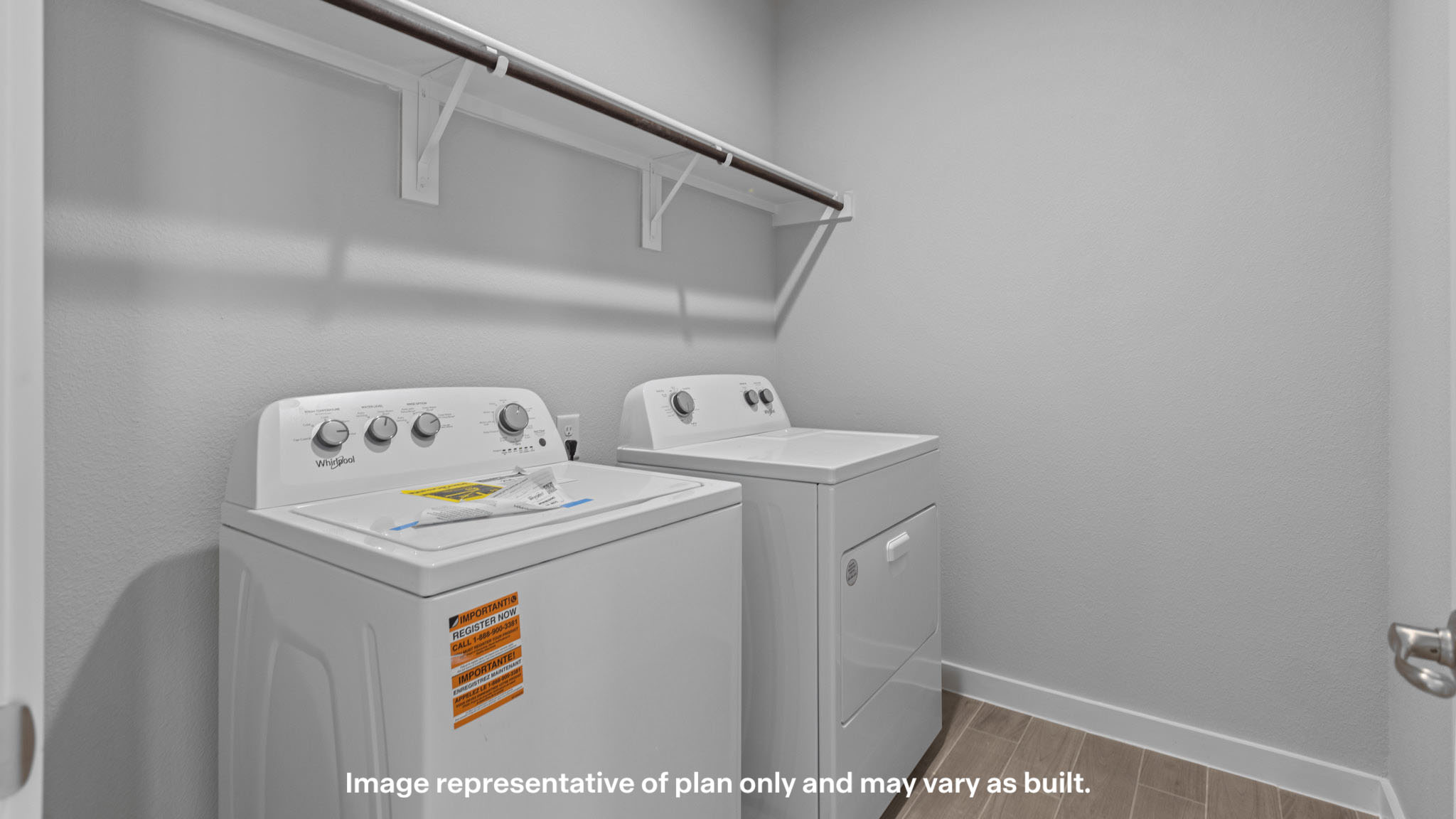 Laundry room and utility closet space with extra storage