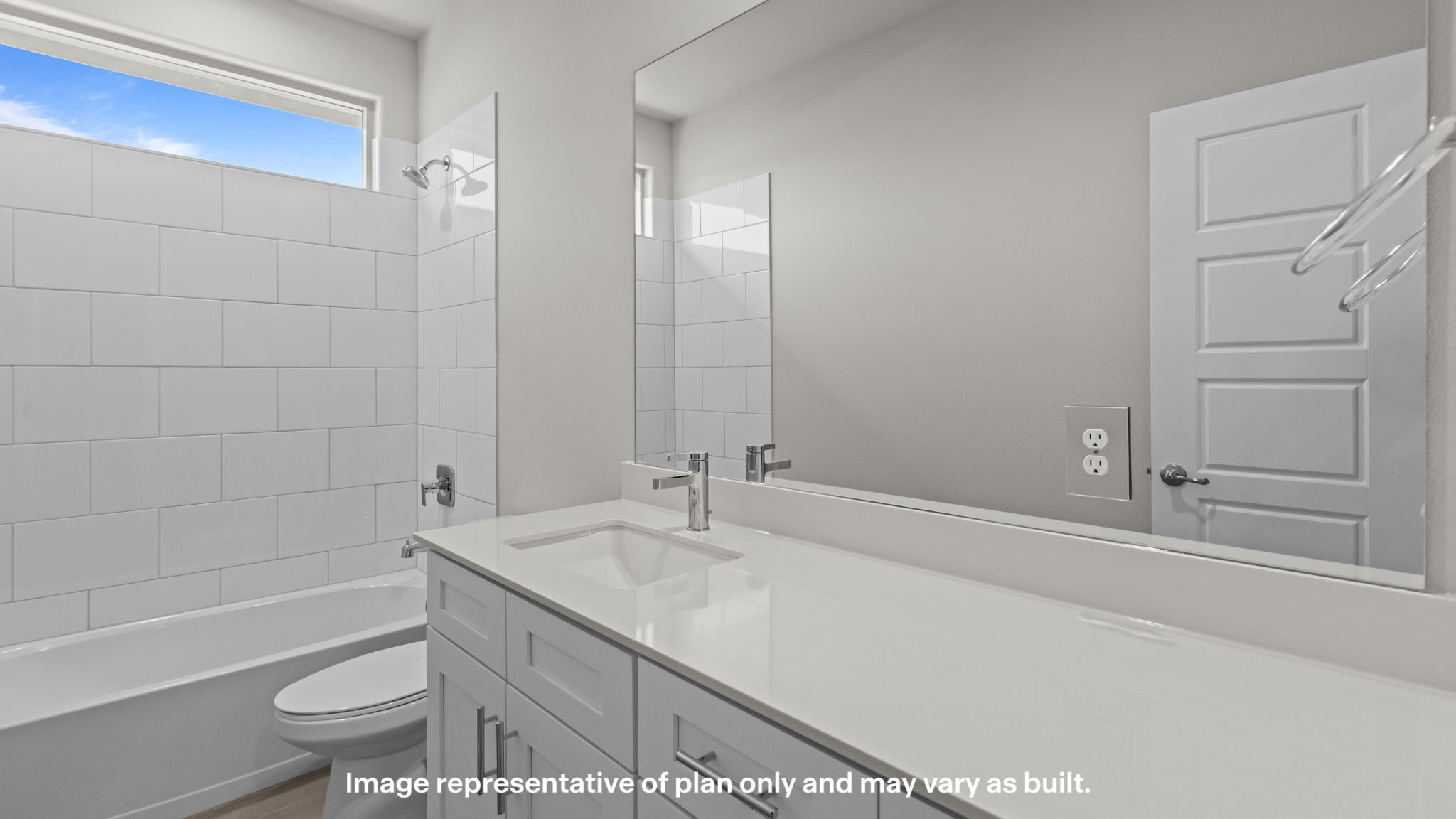 Guest bathroom with built in vanity and combination bathtub shower