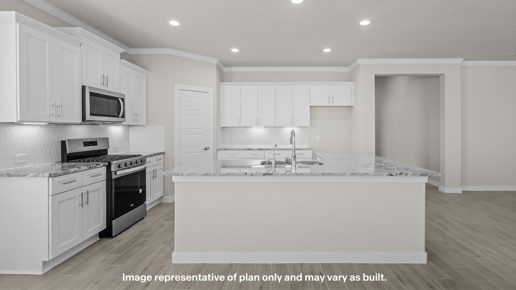 Spacious open concept kitchen with island and counter prep space