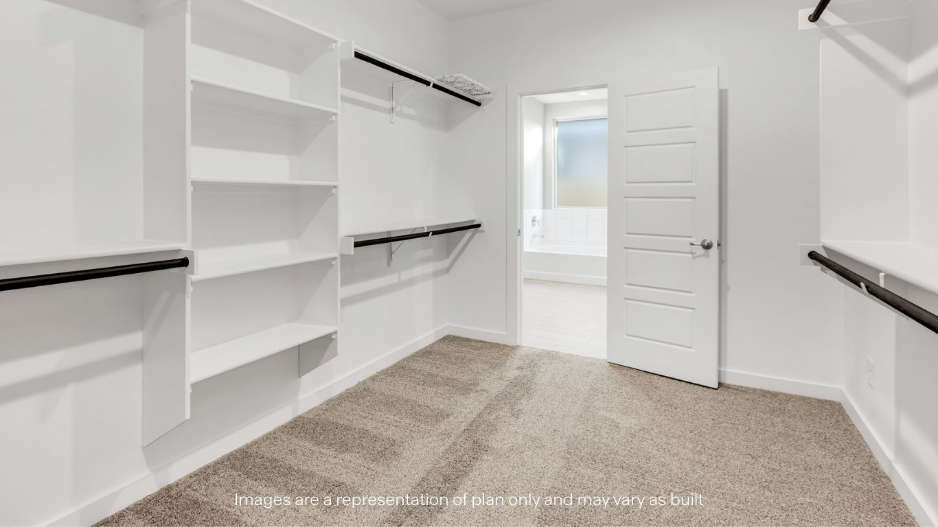 Primary walk-in closet with extra storage space